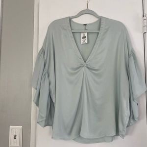 Women’s top large. 100percent rayon. Color Jade.